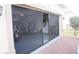 View of screened garage door and paver flooring at 3926 Bedford Ave, Winter Haven, FL 33884