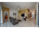 Comfortable living room featuring a ceiling fan, tile flooring, and neutral paint colors at 3926 Bedford Ave, Winter Haven, FL 33884