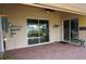 Comfortable brick paved patio with sliding glass doors leading to the interior at 3926 Bedford Ave, Winter Haven, FL 33884