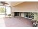 Covered lanai patio showcasing brick pavers, sunshades, and serene outdoor ambiance for entertaining and relaxation at 3926 Bedford Ave, Winter Haven, FL 33884