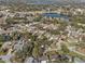 Wide aerial view showing home's location near water at 412 Hillcrest Se Dr, Winter Haven, FL 33884