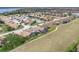 Aerial view of home community with lake and golf course at 4240 Dunmore Dr, Lake Wales, FL 33859