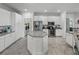 Open concept kitchen with large island and stainless steel appliances at 4240 Dunmore Dr, Lake Wales, FL 33859