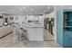 Open kitchen boasts granite island and breakfast bar at 4240 Dunmore Dr, Lake Wales, FL 33859