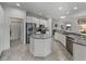 Island kitchen with granite countertops and stainless steel appliances at 4240 Dunmore Dr, Lake Wales, FL 33859