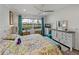 Main bedroom with king-size bed and view to backyard pool at 4240 Dunmore Dr, Lake Wales, FL 33859