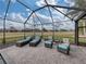Relaxing patio with seating and a view of the neighborhood at 4240 Dunmore Dr, Lake Wales, FL 33859