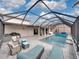 Spacious pool and patio with plenty of seating at 4240 Dunmore Dr, Lake Wales, FL 33859