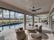 Relaxing patio area with pool and seating at 4240 Dunmore Dr, Lake Wales, FL 33859