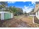 Large backyard with shed, playset, and room for recreation at 428 Durrell Ct, Winter Haven, FL 33884