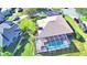 Aerial view showcasing home, pool, and neighborhood setting at 514 Lake Mariam Ter, Winter Haven, FL 33884