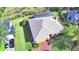 Aerial view of single-Gathering home with pool and screened enclosure at 514 Lake Mariam Ter, Winter Haven, FL 33884