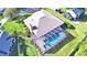 Backyard oasis with a large, screened pool and lush landscaping at 514 Lake Mariam Ter, Winter Haven, FL 33884