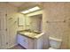 Bathroom with granite vanity and tiled floor at 514 Lake Mariam Ter, Winter Haven, FL 33884