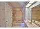 Bathroom with shower, tub, vanity, and toilet at 514 Lake Mariam Ter, Winter Haven, FL 33884