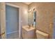 Simple bathroom with updated vanity and toilet at 514 Lake Mariam Ter, Winter Haven, FL 33884