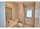 Clean bathroom with vanity, toilet and exterior access at 514 Lake Mariam Ter, Winter Haven, FL 33884