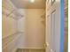Large walk-in closet with wire shelving at 514 Lake Mariam Ter, Winter Haven, FL 33884