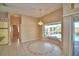 Bright dining room with pool view and decorative flooring at 514 Lake Mariam Ter, Winter Haven, FL 33884