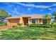 Single-story house with a large front lawn at 514 Lake Mariam Ter, Winter Haven, FL 33884