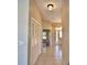 Bright hallway with tile floors and closet space at 514 Lake Mariam Ter, Winter Haven, FL 33884