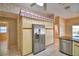 Spacious kitchen features granite countertops and stainless steel appliances at 514 Lake Mariam Ter, Winter Haven, FL 33884
