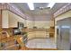 Kitchen with granite countertops and stainless steel appliances at 514 Lake Mariam Ter, Winter Haven, FL 33884