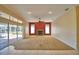 Living room with fireplace and access to the pool area at 514 Lake Mariam Ter, Winter Haven, FL 33884