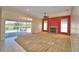 Living room with fireplace, sliding doors to pool, and carpet at 514 Lake Mariam Ter, Winter Haven, FL 33884