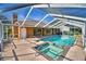 Relaxing screened pool and spa area at 514 Lake Mariam Ter, Winter Haven, FL 33884