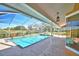 Inviting screened pool area with spa at 514 Lake Mariam Ter, Winter Haven, FL 33884
