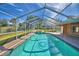 Refreshing screened pool and spa at 514 Lake Mariam Ter, Winter Haven, FL 33884