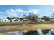 Aerial view of homes near a lake at 524 Lake Suzanne Dr, Lake Wales, FL 33859