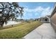 Backyard with lake view and patio at 524 Lake Suzanne Dr, Lake Wales, FL 33859