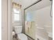Clean bathroom with a toilet, shower, and single vanity at 524 Lake Suzanne Dr, Lake Wales, FL 33859