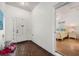 Bright entryway with brick flooring and view of bedroom at 524 Lake Suzanne Dr, Lake Wales, FL 33859