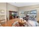 Living room with hardwood floors, fireplace, and lake view at 524 Lake Suzanne Dr, Lake Wales, FL 33859