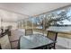 Enjoy lake views from this screened patio with seating at 524 Lake Suzanne Dr, Lake Wales, FL 33859