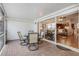 Screened patio with glass doors leading to living room at 524 Lake Suzanne Dr, Lake Wales, FL 33859