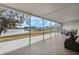 Spacious screened porch with lake and golf course views at 524 Lake Suzanne Dr, Lake Wales, FL 33859
