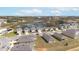 Community view showing houses and a lake at 716 Brooklet Dr, Davenport, FL 33837