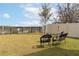 Spacious backyard with seating area and water view at 716 Brooklet Dr, Davenport, FL 33837