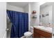 Simple bathroom with shower/tub combo and vanity at 716 Brooklet Dr, Davenport, FL 33837