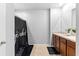 Shared bathroom with double vanity and shower at 716 Brooklet Dr, Davenport, FL 33837