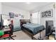 Bedroom with double bed, desk and gaming chair at 716 Brooklet Dr, Davenport, FL 33837