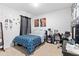 Bedroom with double bed, desk and patterned bedding at 716 Brooklet Dr, Davenport, FL 33837