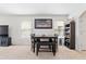 Cozy dining area with a table, bench and shelving at 716 Brooklet Dr, Davenport, FL 33837
