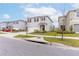 Two-story house with attached garage and small front yard at 716 Brooklet Dr, Davenport, FL 33837