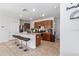 Modern kitchen with island, stainless steel appliances and breakfast bar at 716 Brooklet Dr, Davenport, FL 33837