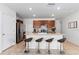 Modern kitchen with stainless steel appliances and an island with seating at 716 Brooklet Dr, Davenport, FL 33837